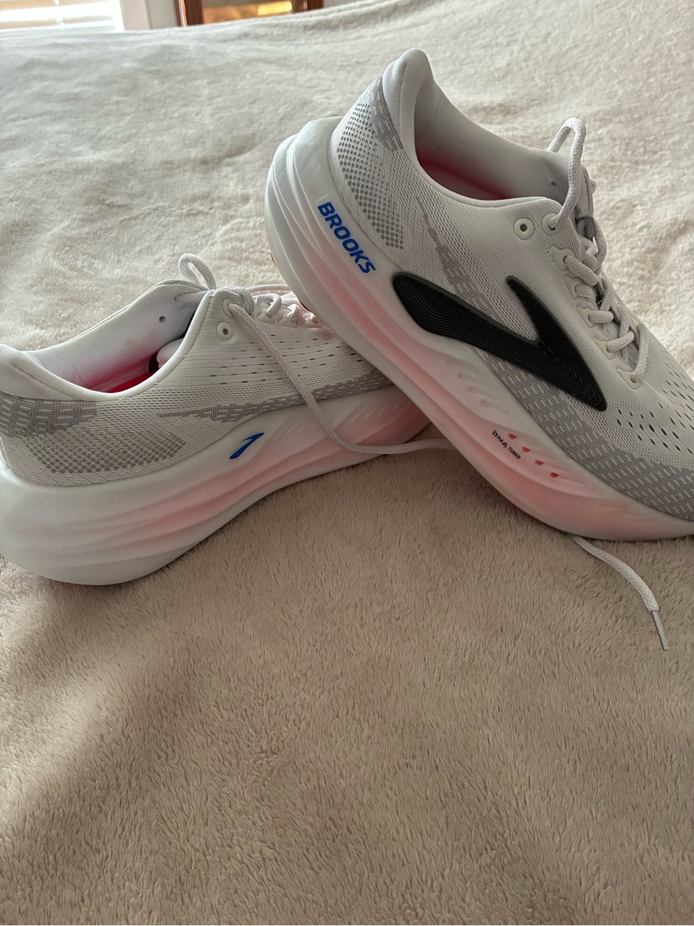 Brooks Women's White Running Shoes with Pink Accent and Black Logo